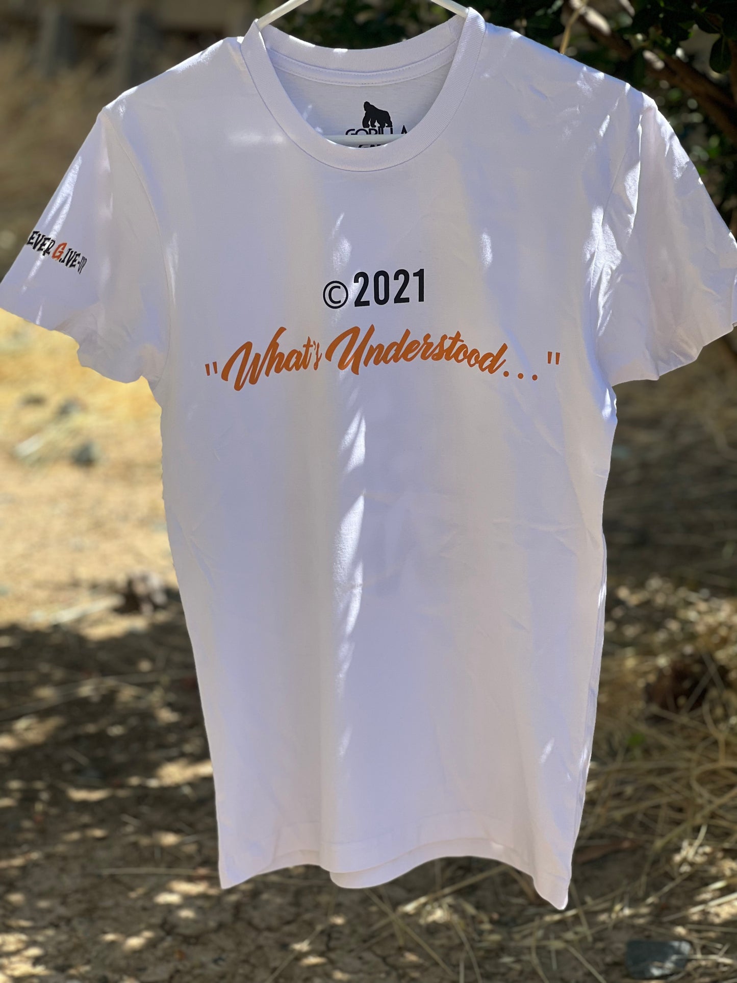 Orange What’s Understood Tee